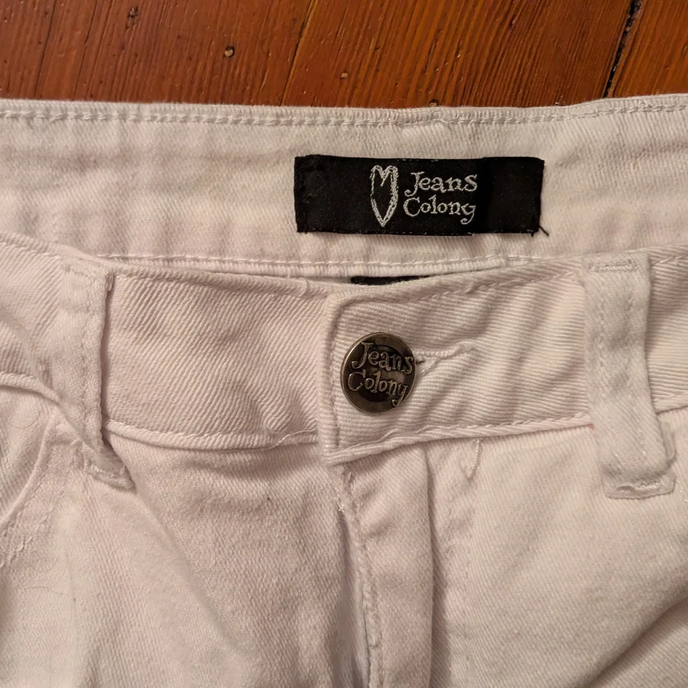 Women's White Distressed Denim Shorts
